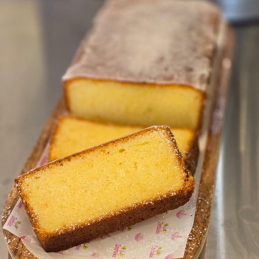 Loaf of Lemon Bread with a slice cut